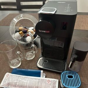 Nespresso Machine + coffee pods + coffee pod dispenser + nespresso coffee mugs